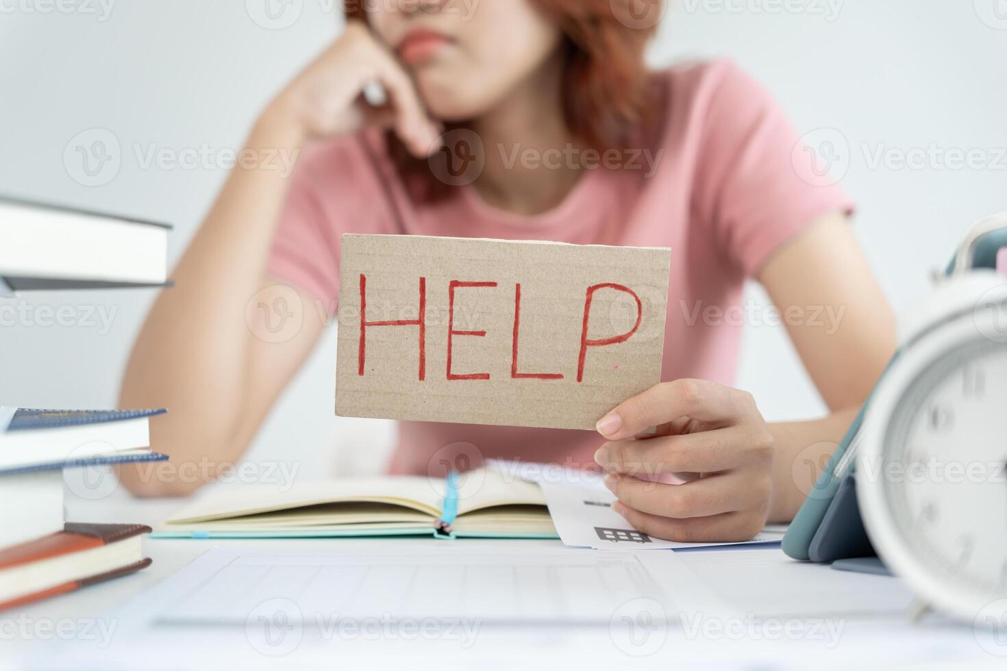 Asian student woman have anxiety because of exams, female prepare for test and learning lessons in the library. stress, despair, haste, misunderstanding reading, discouraged, expectation, knowledge photo