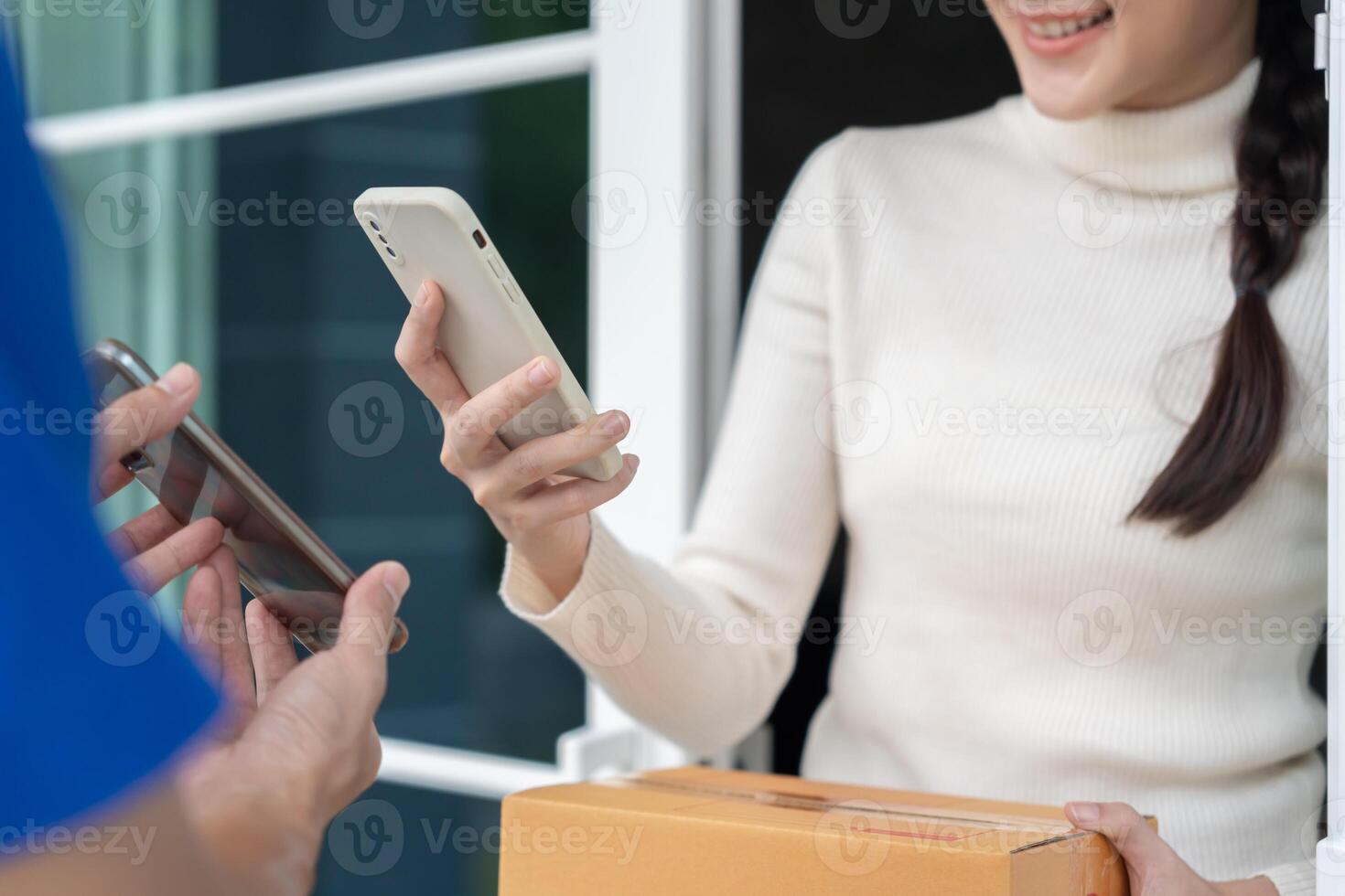 Happy smile Asian woman scan QR code for pay of food. Delivery man send deliver express. online shop, paper container, takeaway, postman, delivery service, packages, electronic money, Digital transfer photo