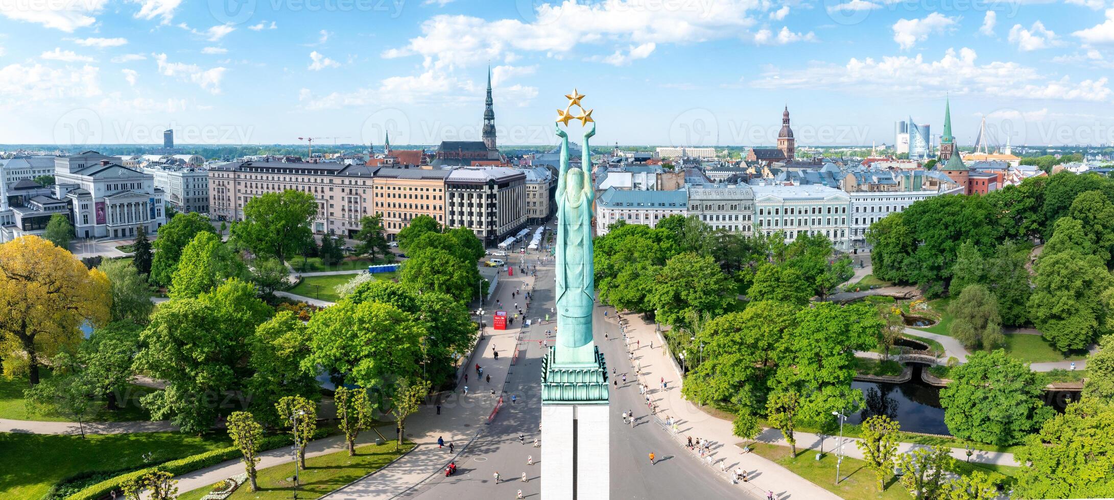 Aerial View of the Freedom Monument Surrounded by Lush Greenery in Riga photo