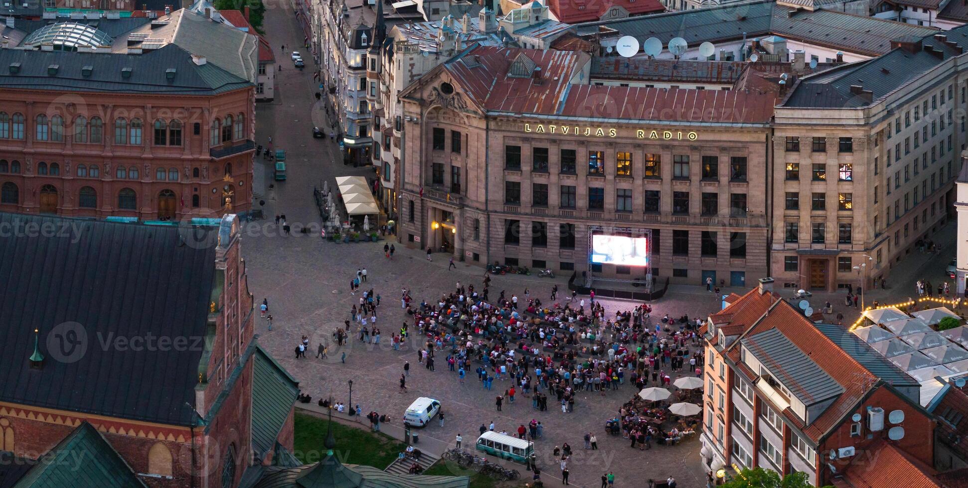 Aerial View of Crowd in Riga City Square with Latvijas Radio Building photo