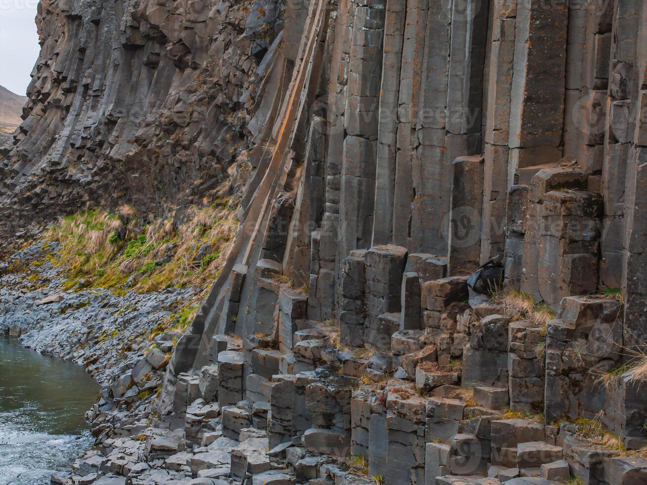 Close-Up of Hexagonal Basalt Columns in Iceland's Unique Geological Landscape photo