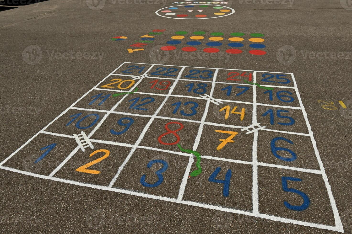 a large play area with numbers and numbers painted on the ground photo