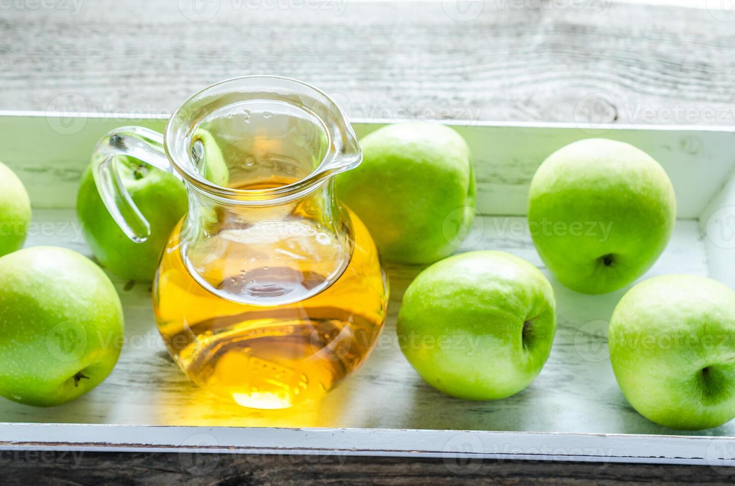 Apple juice with fresh apples photo