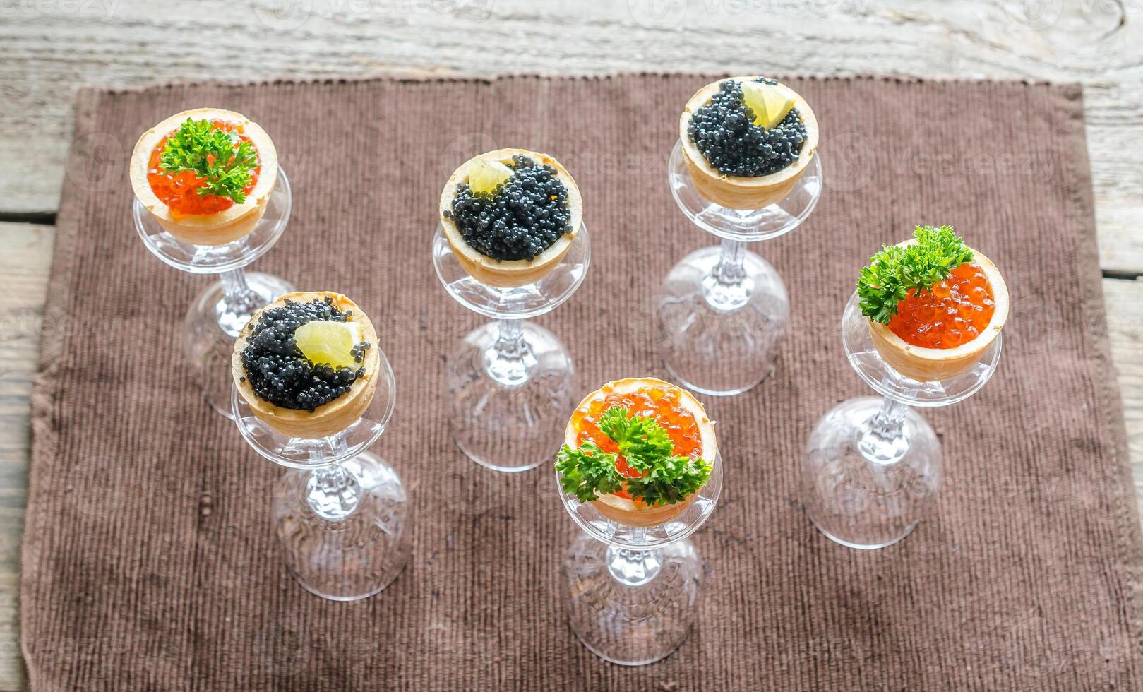 Sandwiches with black and red caviar photo