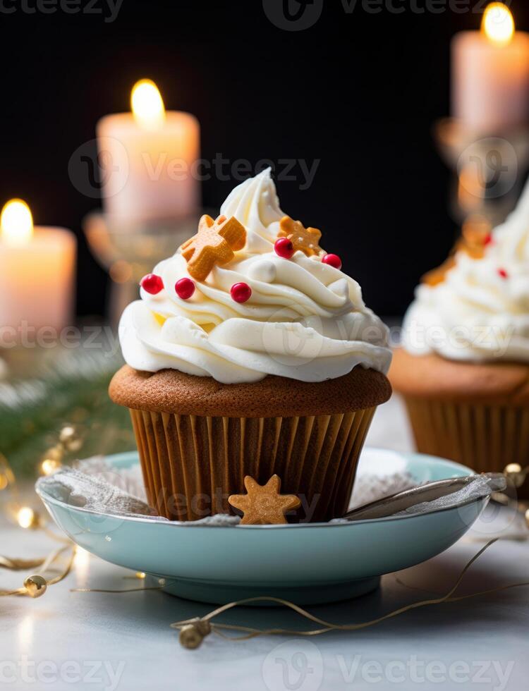 A beautiful cupcake on a saucer against the backdrop of Christmas decorations photo