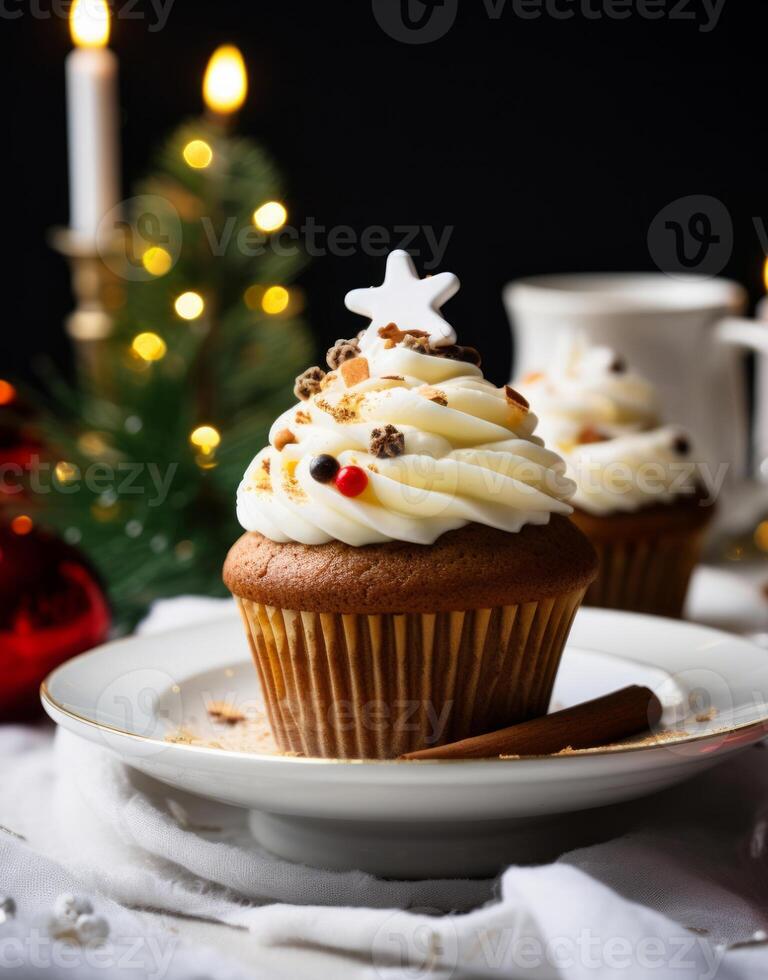 A beautiful cupcake on a saucer against the backdrop of Christmas decorations photo