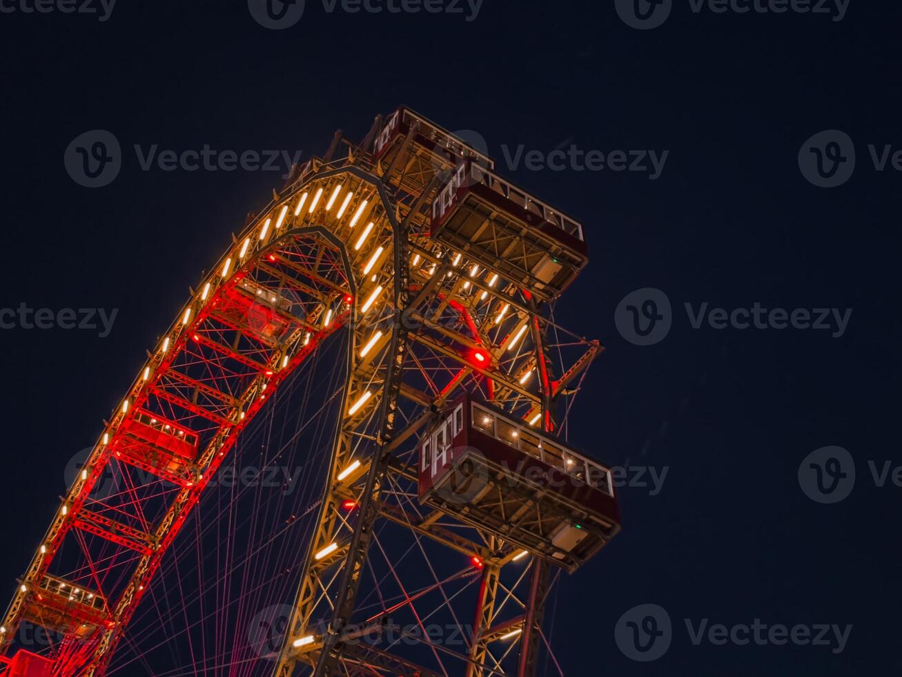 A ferris wheel at night. photo