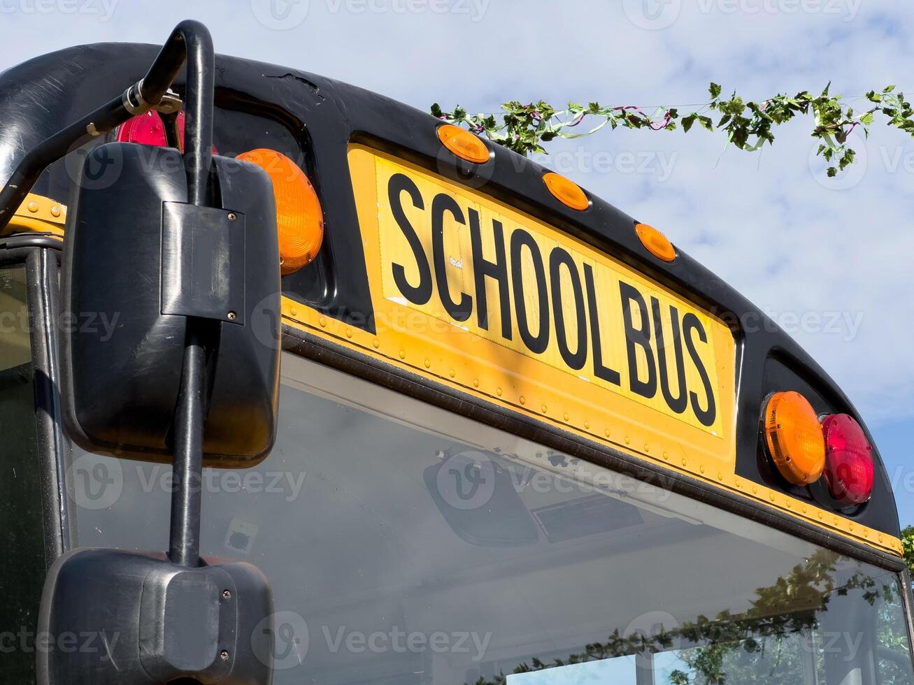 the front of a yellow school bus photo