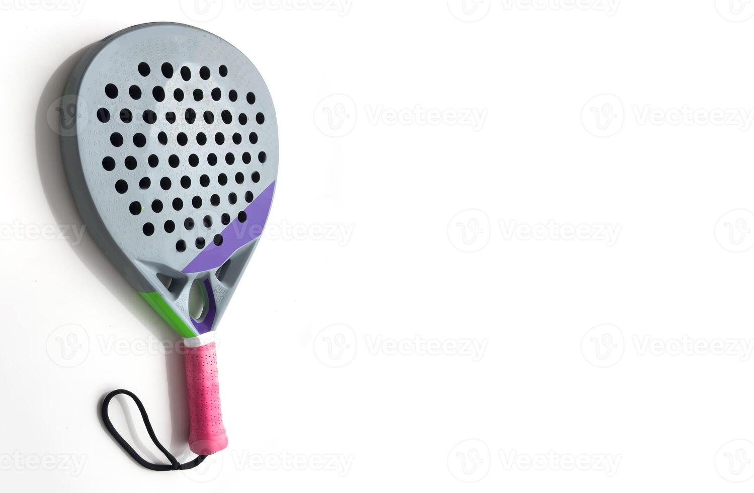 paddle tennis racket on white table and white isolated background. Front view. photo
