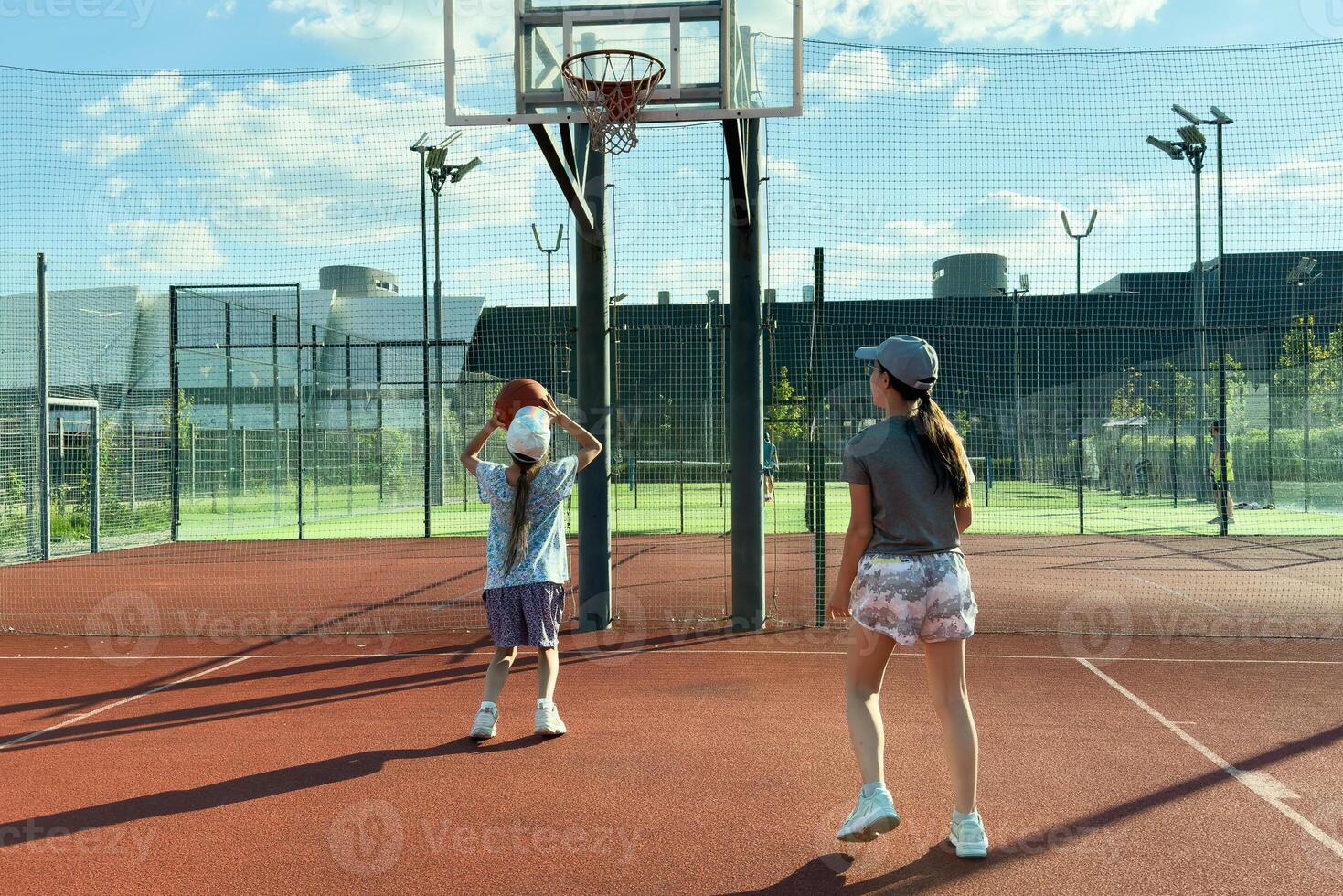 Girls play Street Basketball in the summer Street Basketball League photo