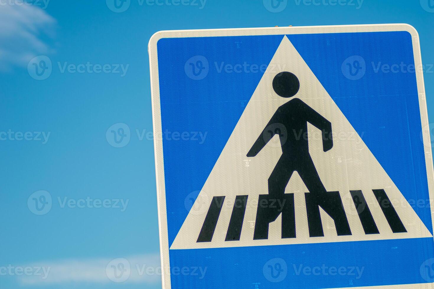 detail of a pedestrian crossing sign photo