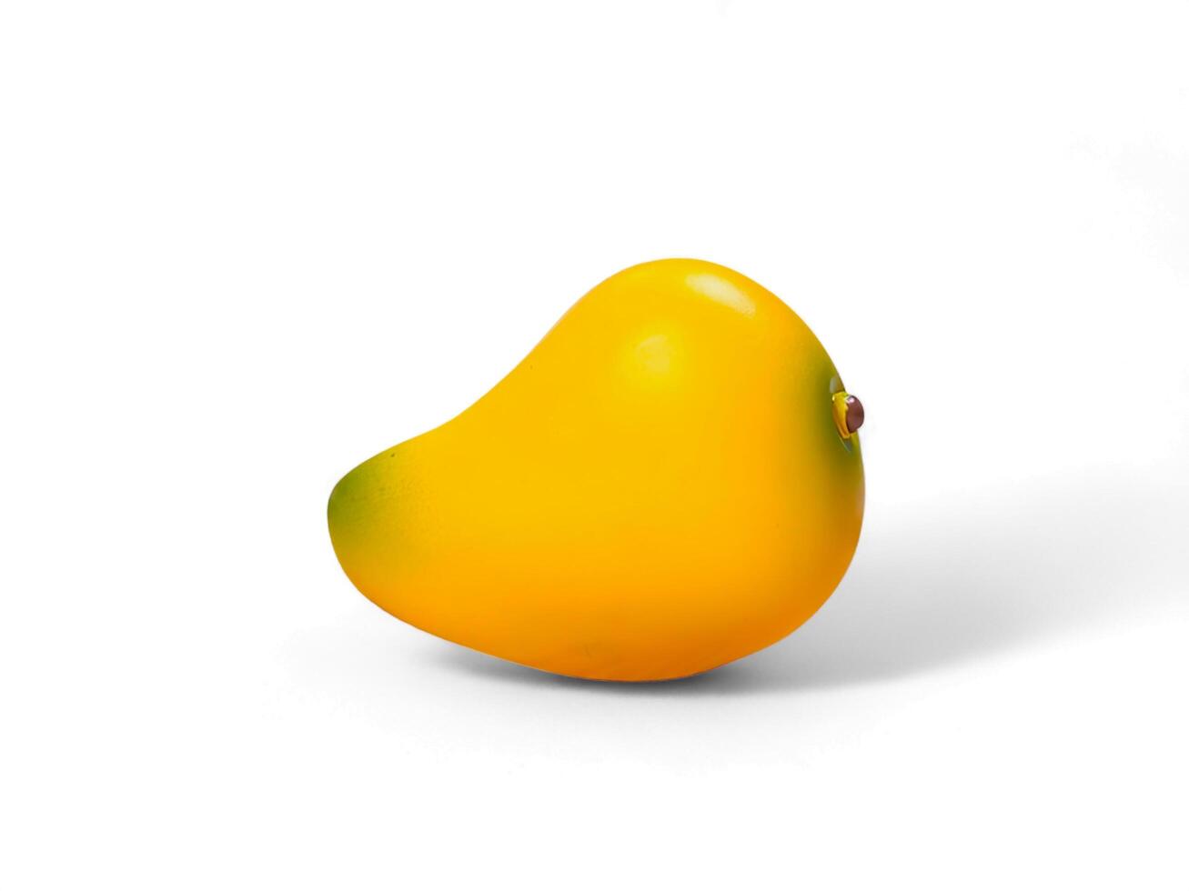 Miniature of mango isolated on white photo