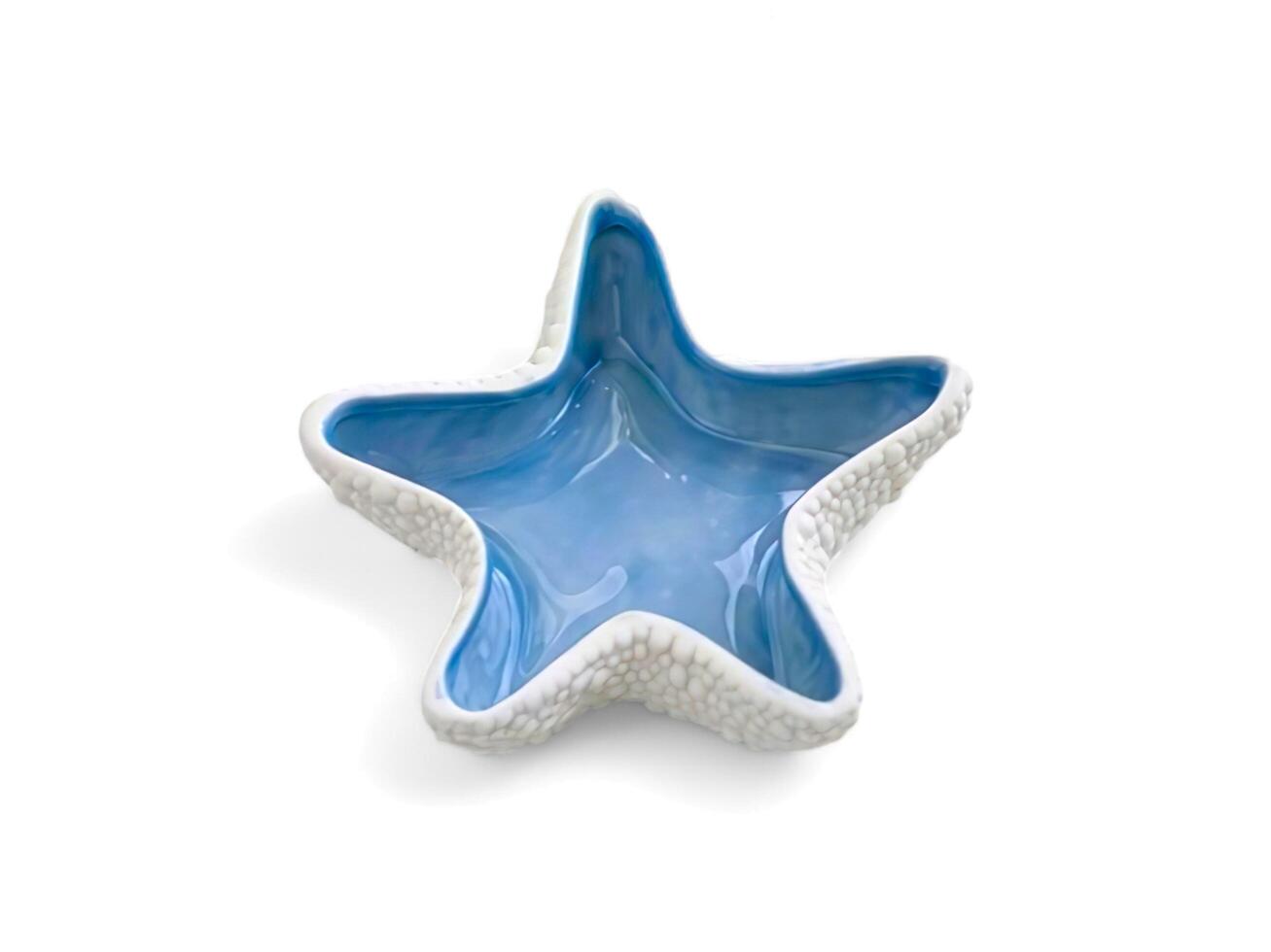 star-shaped ashtray on a white background photo