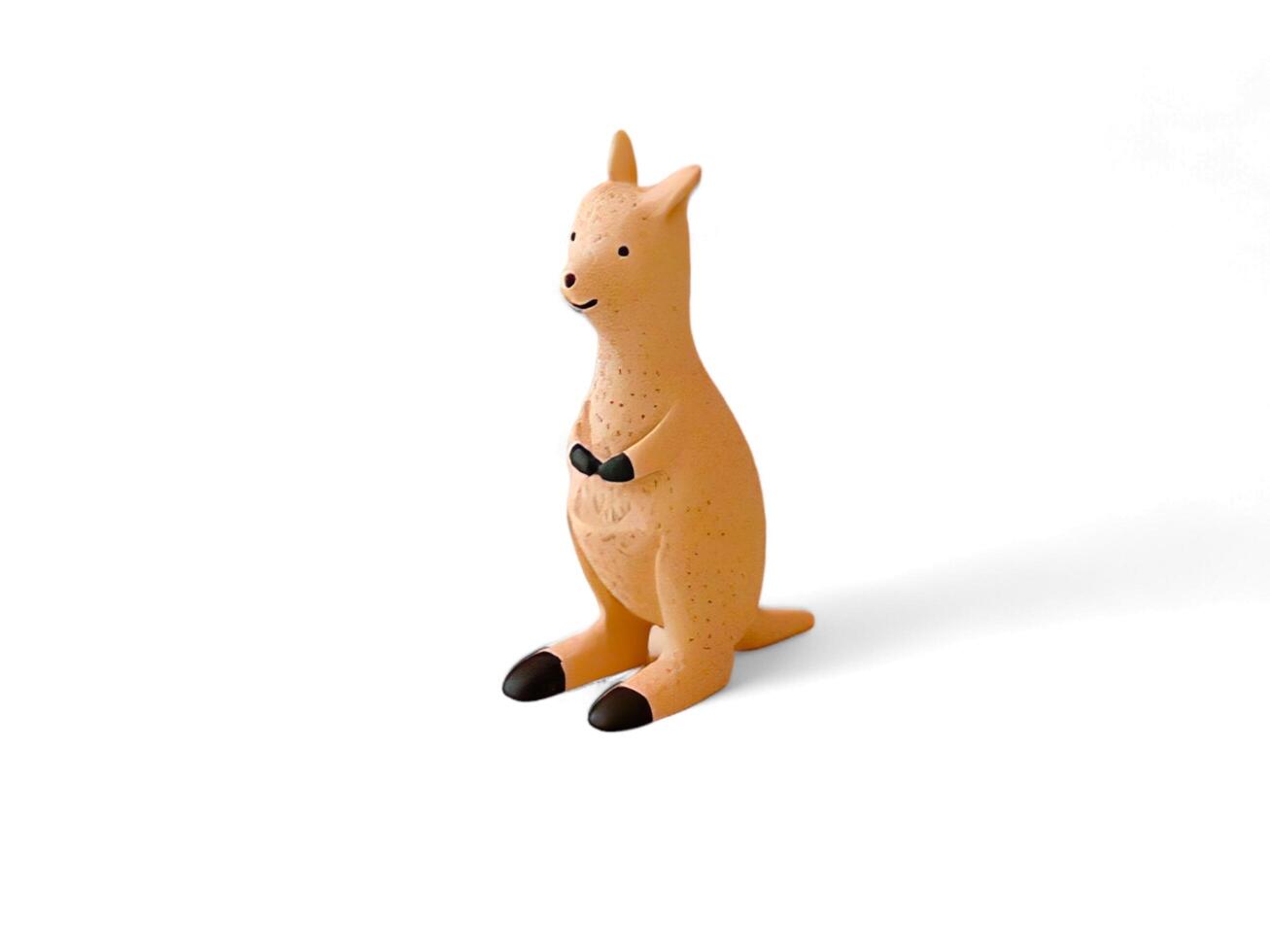 miniature wooden kangaroo on a white background photo