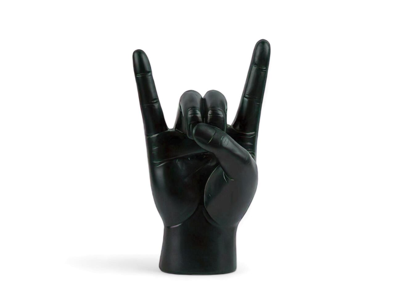 black hand decoration with metal shapes on a white background photo