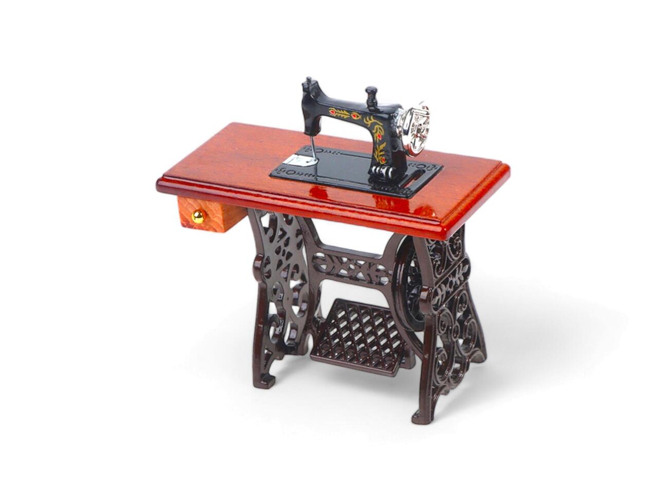 sewing machine on white background photo