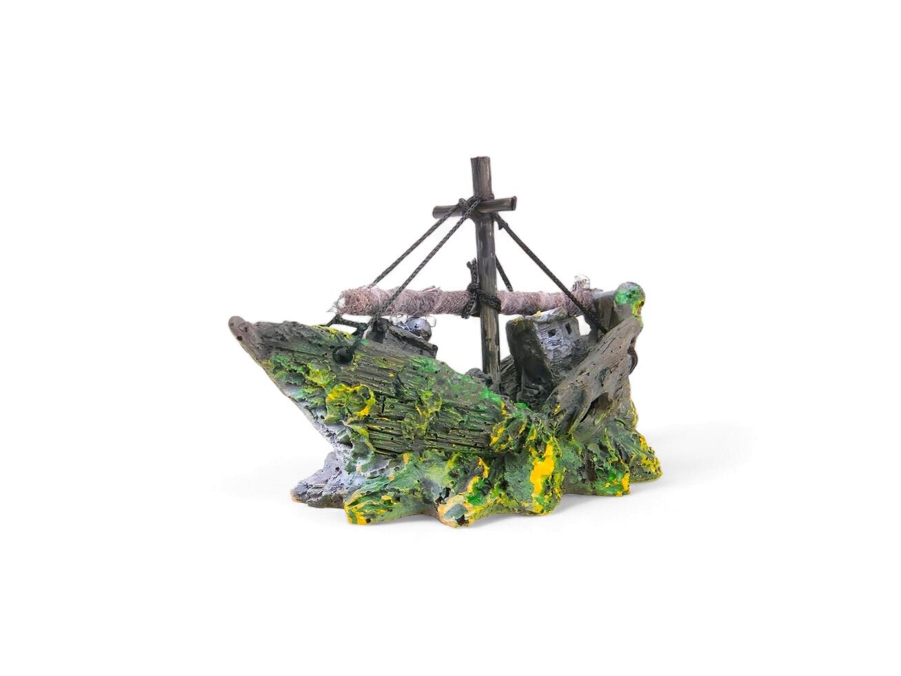 miniature coral ship on a white background photo