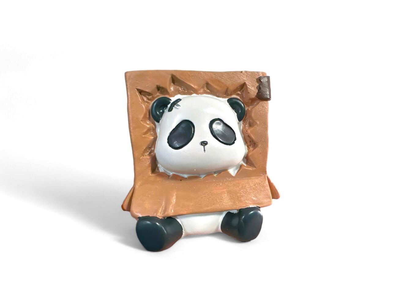Decorated miniature panda in cardboard on a white background photo
