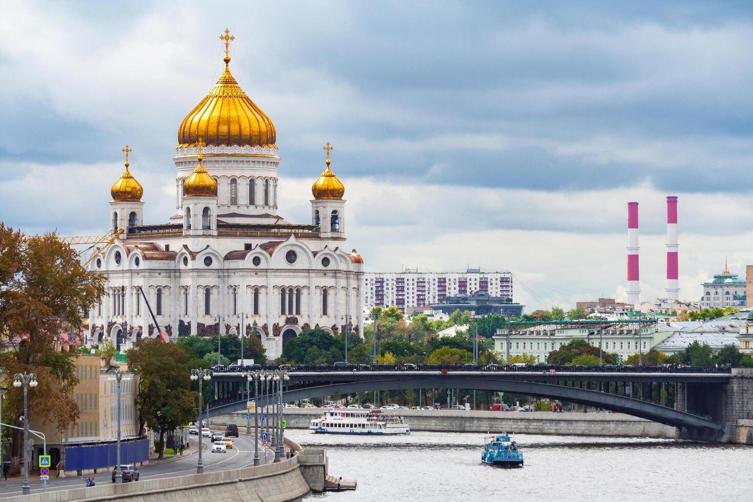Moscow, Russia, August 2018 General view on a Cathedral of Christ the Savior and Bolshoy Kamenny Bridge photo