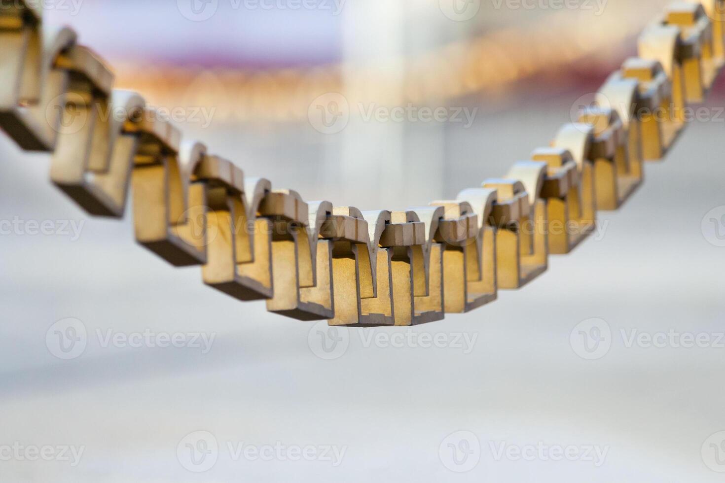 Gilded Iron chain on a neutral background photo