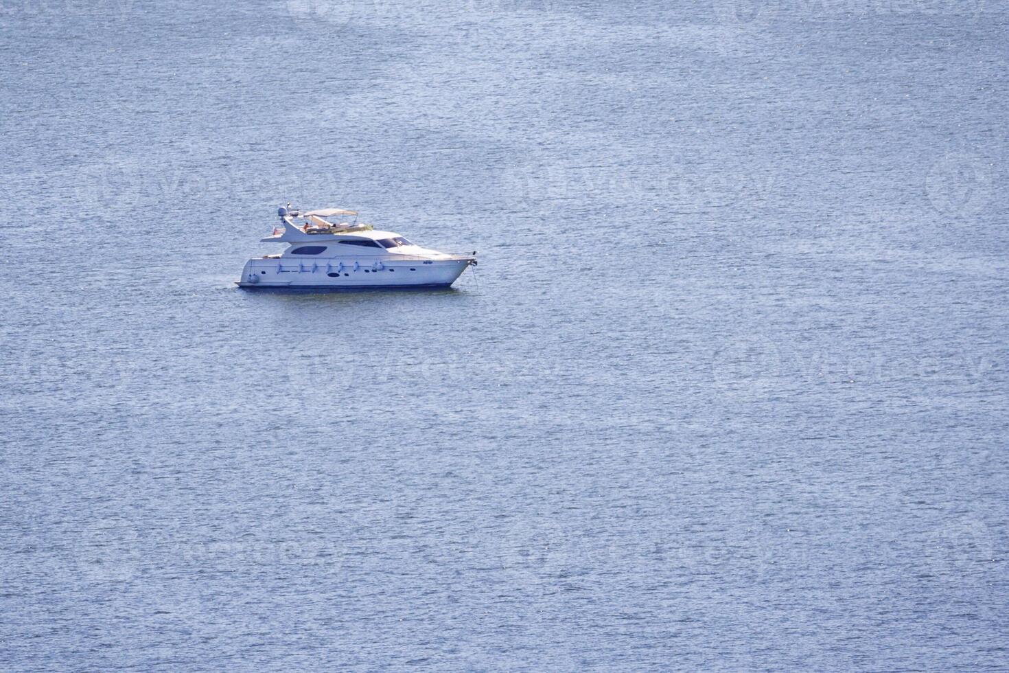 View on the private motor yacht on the water with copy space photo