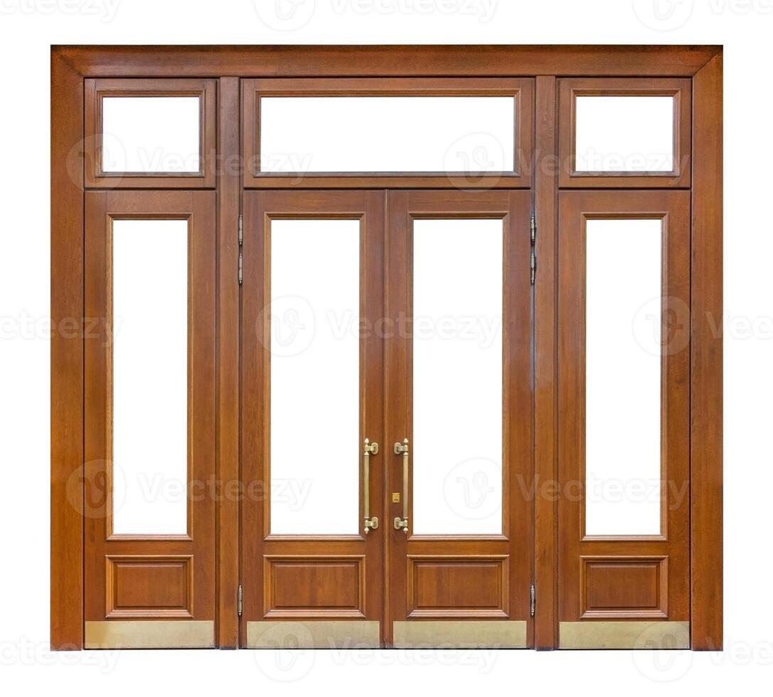 Large wooden entrance with cutout windows and double door with long gilded knobs, isolated on white background photo