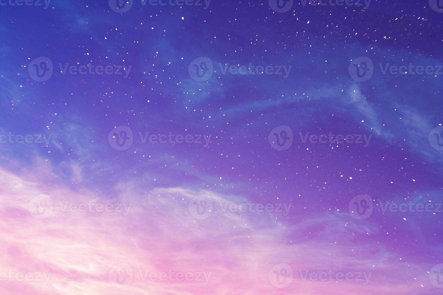 View on a evening purple sky with cirrus clouds and stars photo