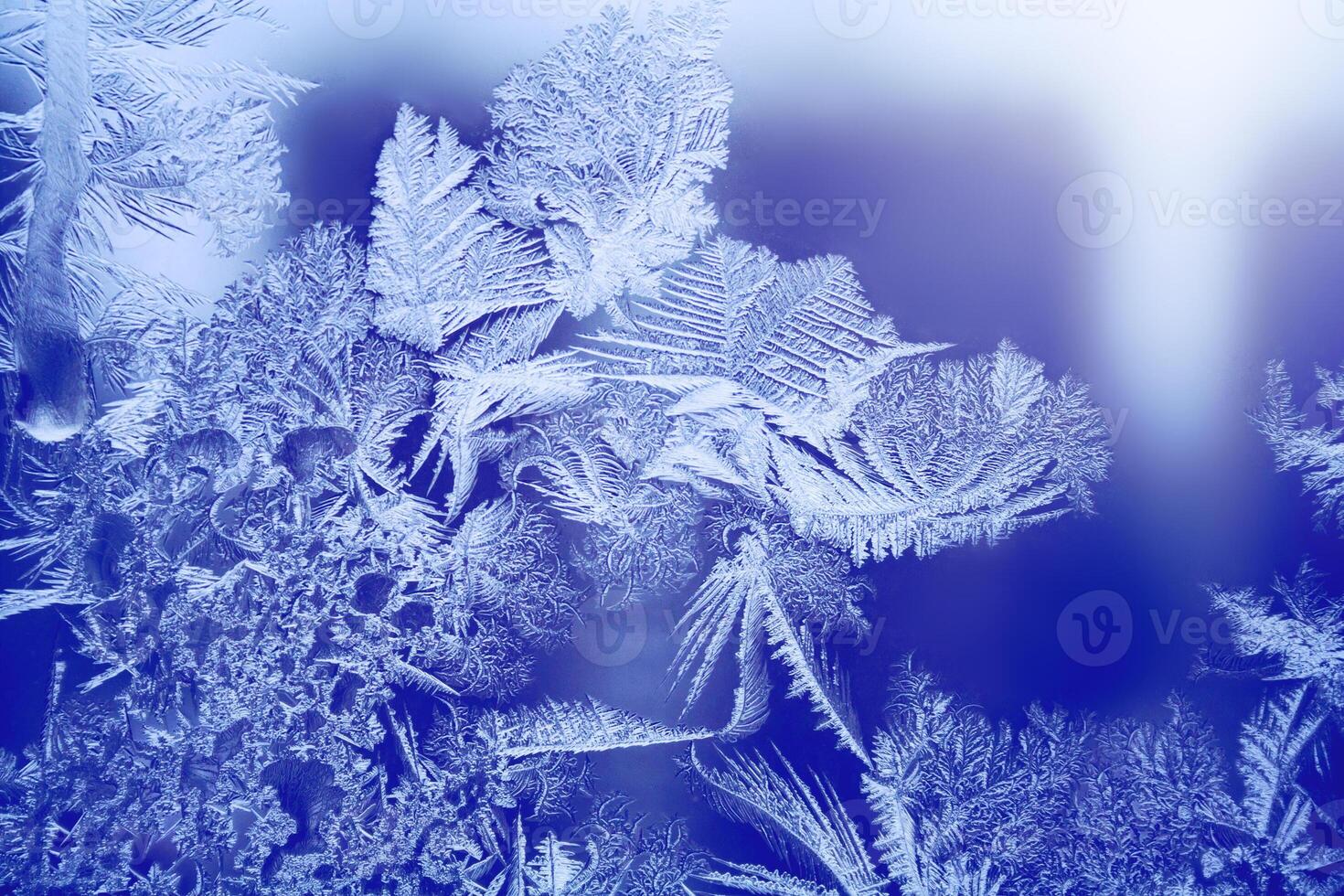 Frosty pattern on the glass window. Abstract, background, texture photo