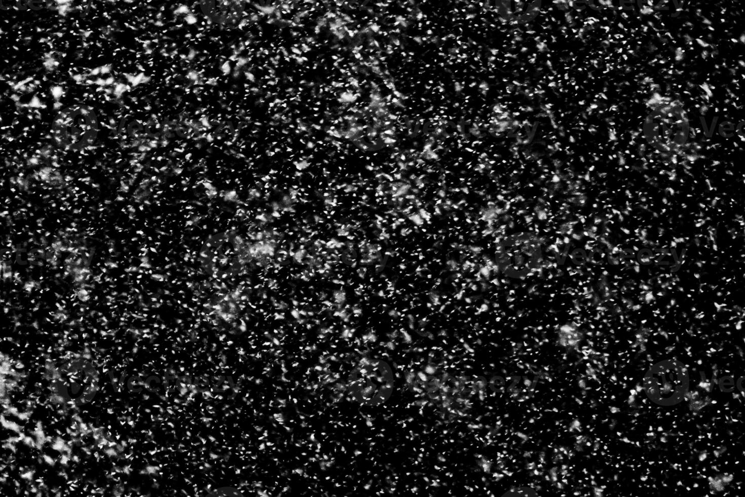 Snowfall on a black background - design element photo