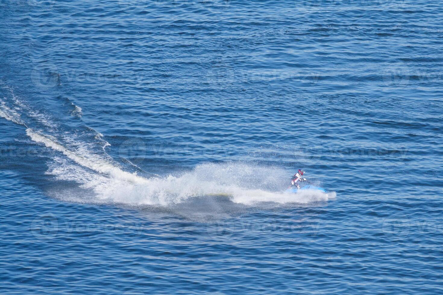 View on a jetski on the blue water photo