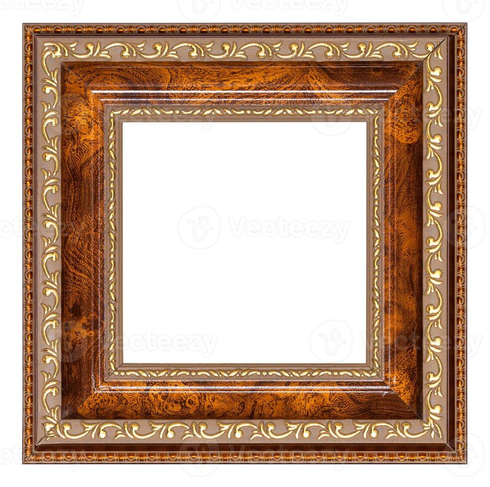 Brown picture frame with gilded floral pattern isolated on a white background photo