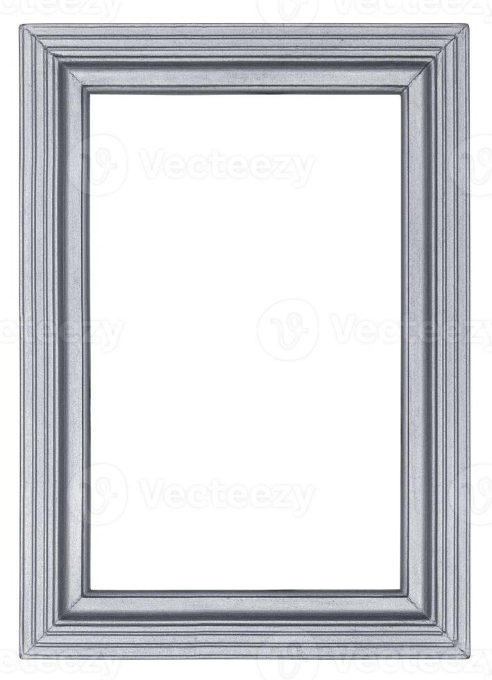 Silvered wooden picture frame with carved linear pattern in retro style isolated on white background photo