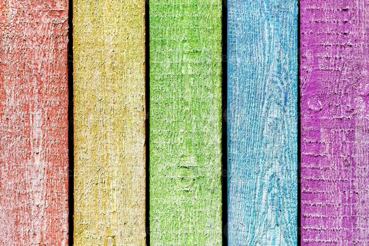 Aged multi colored wooden planks, painted as rainbow photo
