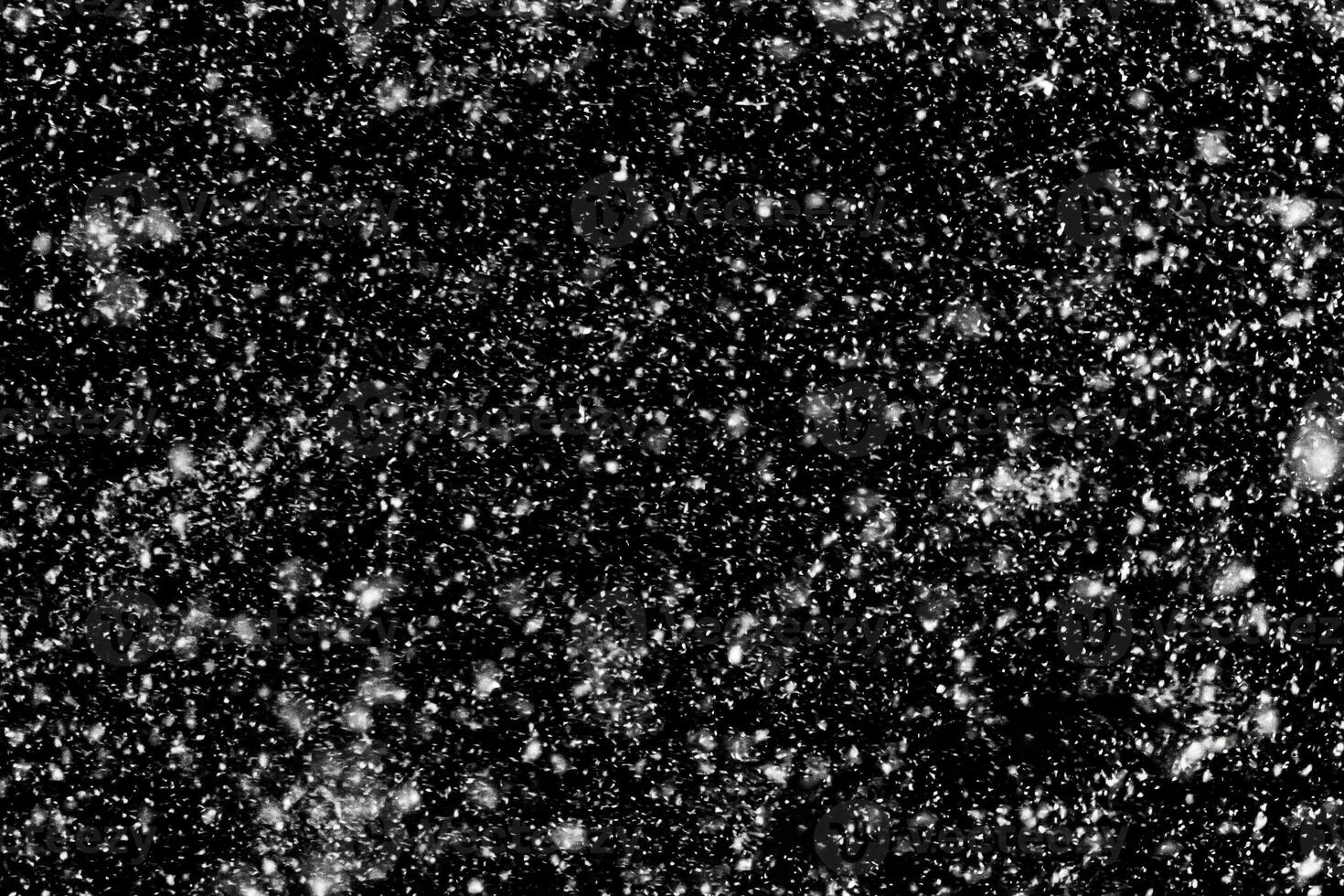 Snowfall on a black background - design element photo