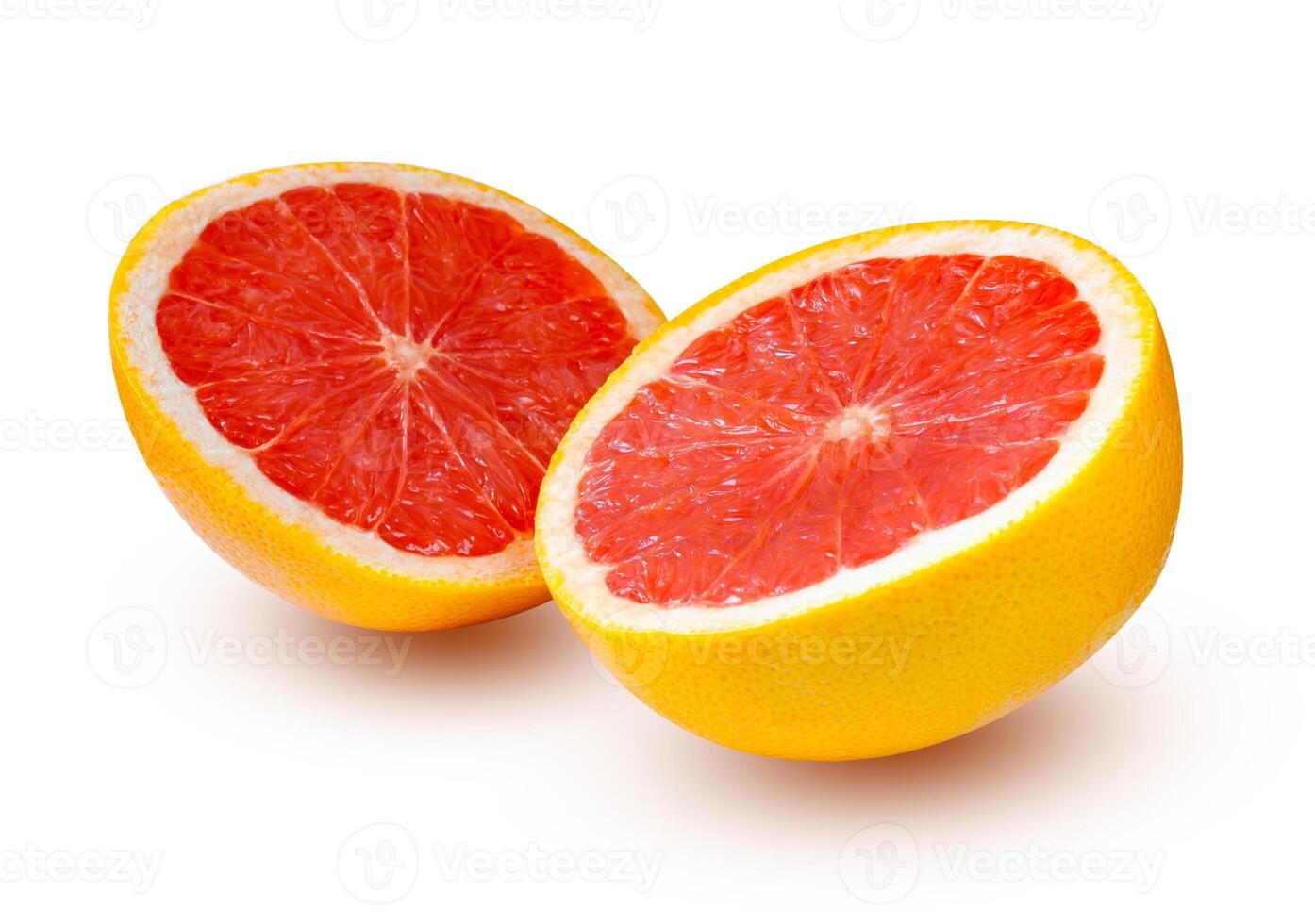 Two halves of grapefruit with shadows isolated on a white background photo