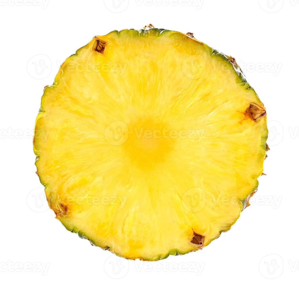 Round pineapple slice isolated on a white background photo