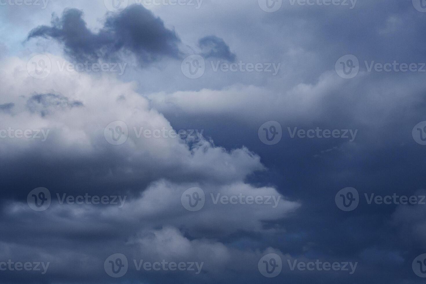 View on low leaden storm clouds in the sky photo