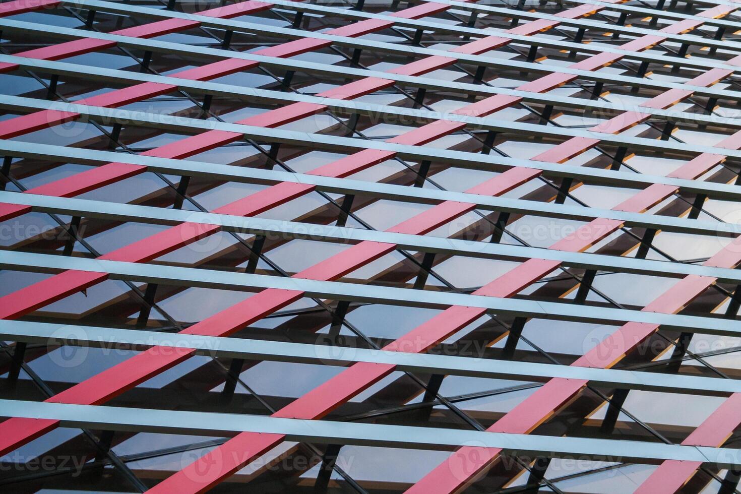 Abstract view of a fragment of modern building of glass and metal as background photo