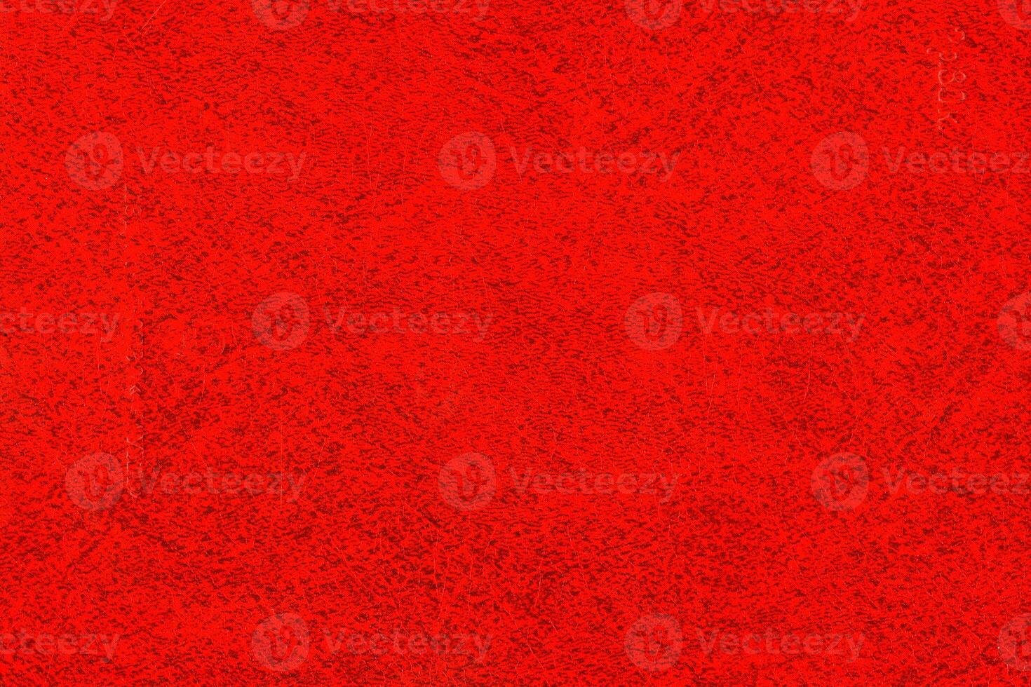 Abstract red background. Texture of the book cover with specks photo