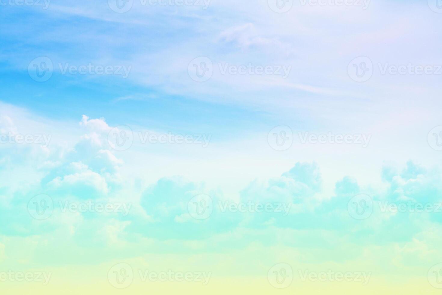 Turquoise fluffy clouds in azure sky as background photo