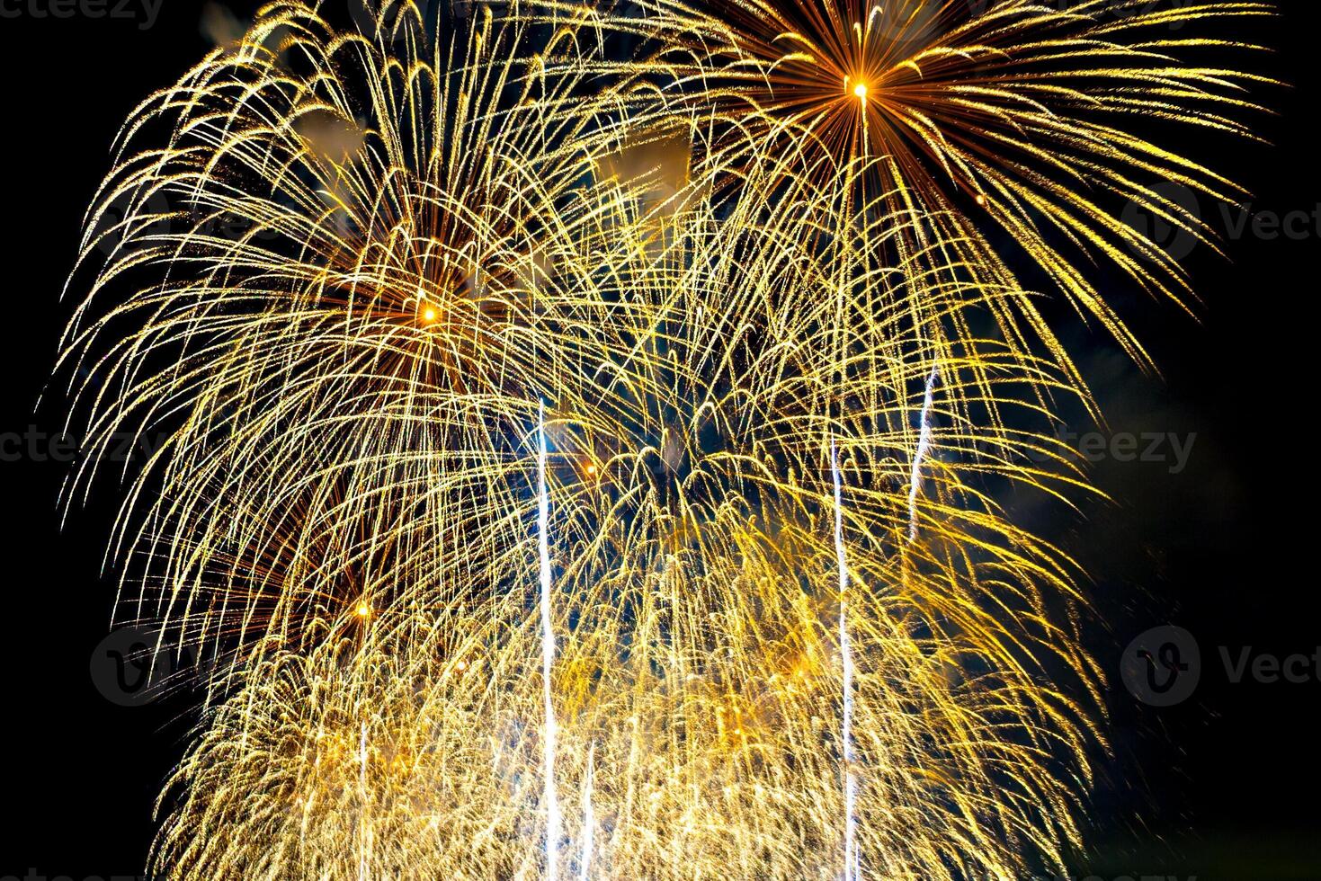 Fireworks display on dark sky background. photo