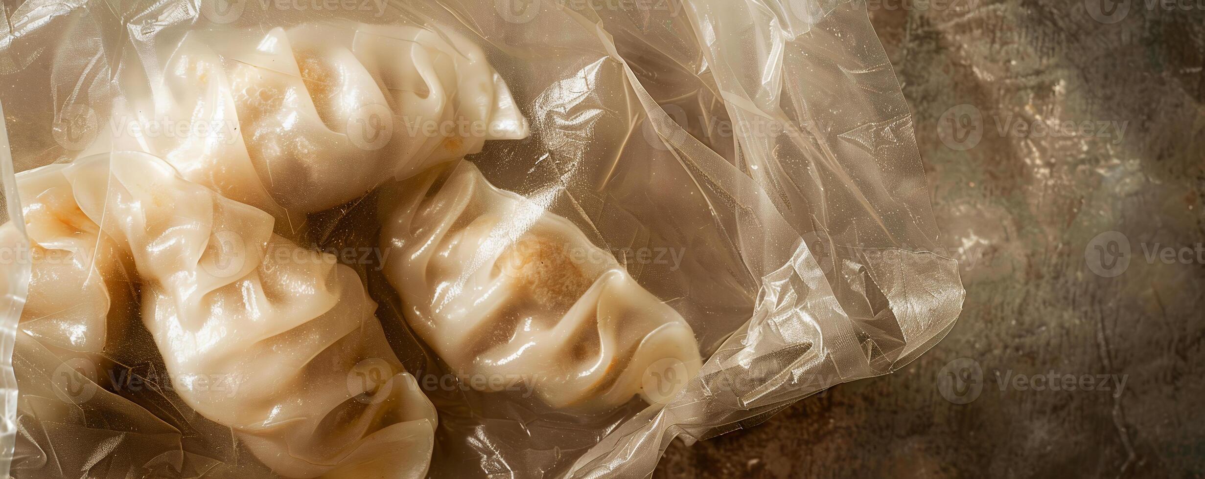 Bag of frozen chicken potstickers with a savory filling, perfect for dipping. photo