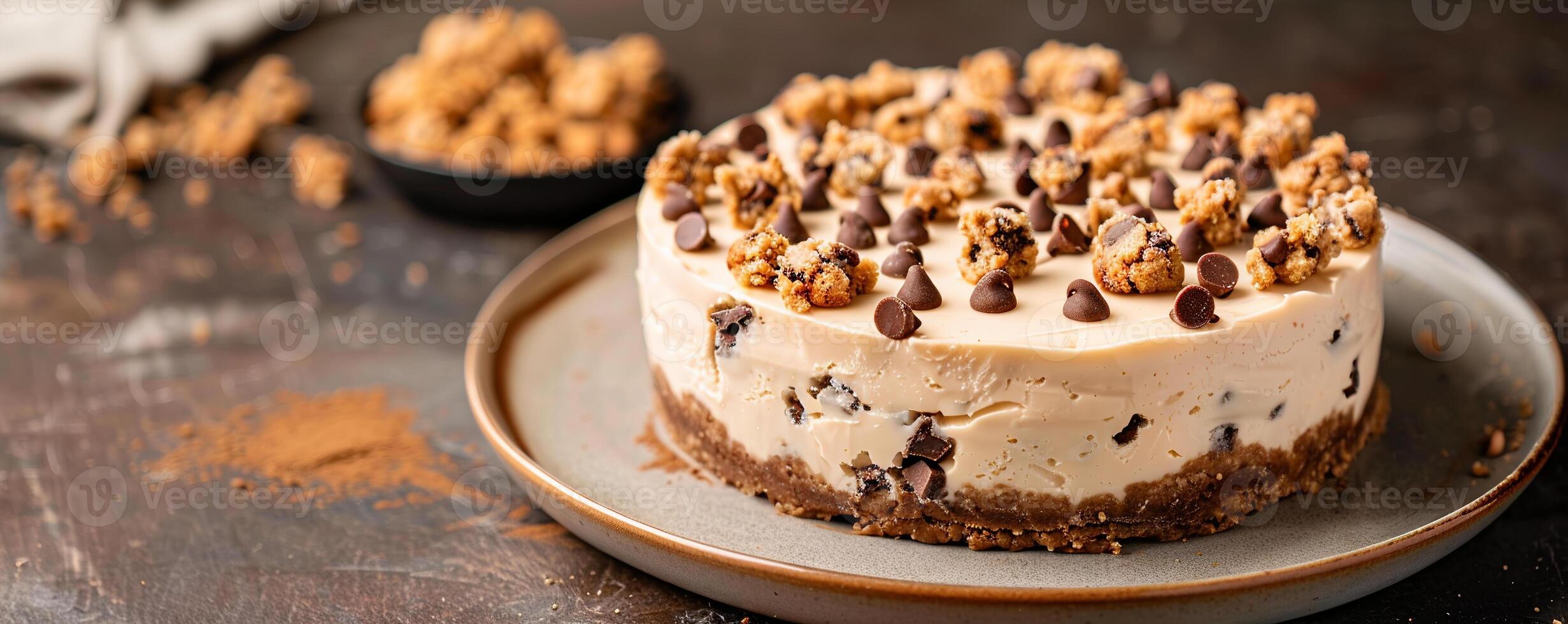 Creamy chocolate chip cookie dough cheesecake, garnished with cookie crumbles. photo