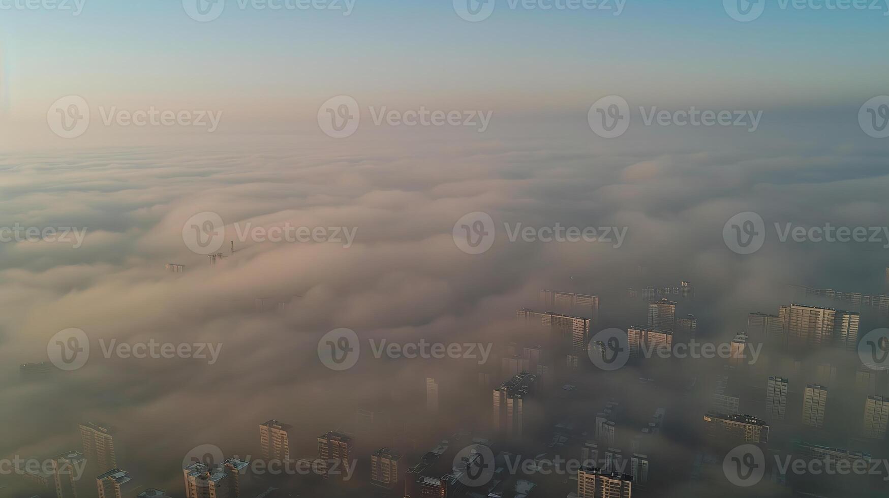 Aerial view of a megacity engulfed in a thick layer of smog, emphasizing the scale and severity of air pollution in densely populated urban areas. Air pollution bad ecology photo
