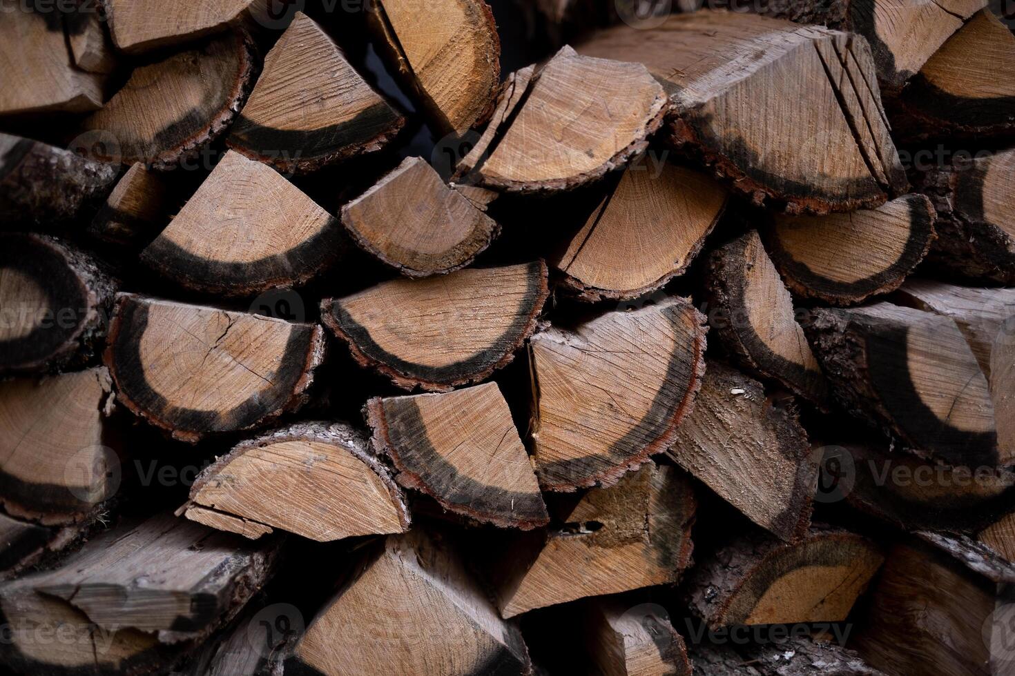 neatly stacked firewood, great background for design photo