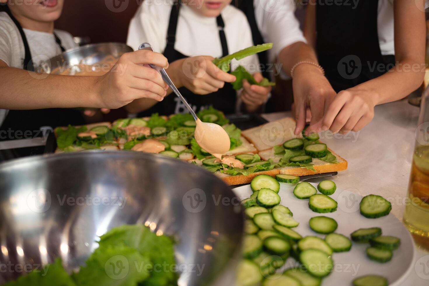 close-up shot. hands holding fresh chicken toast at cooking classes photo