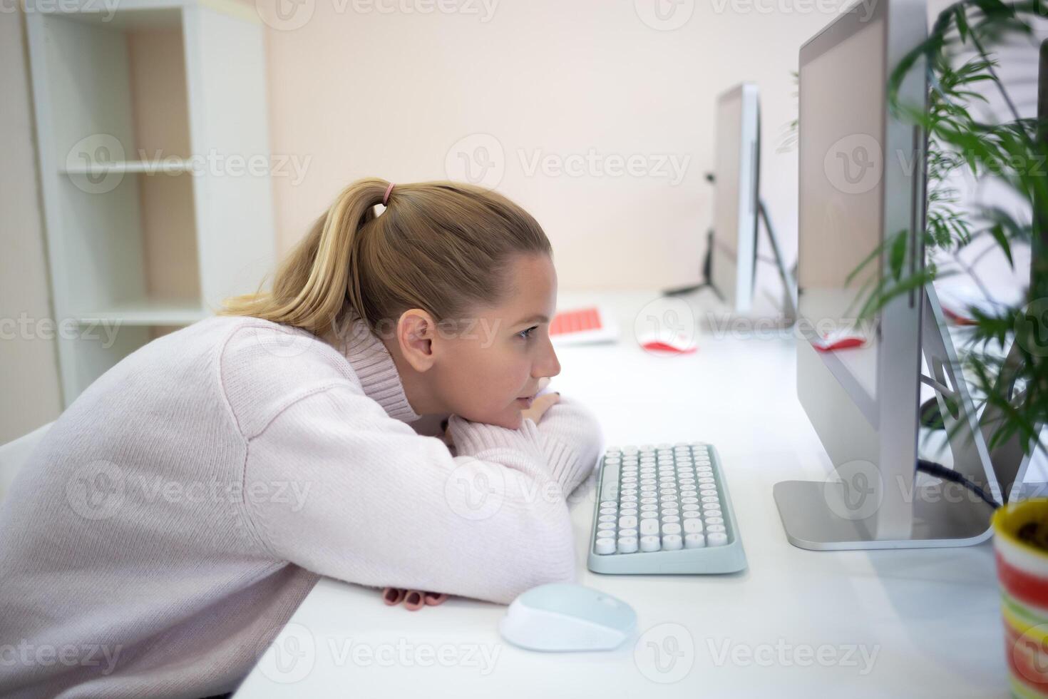 young woman is sad at the workplace. office work concep photo