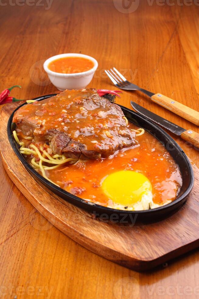 Rib eye steak with barbeque sauce photo