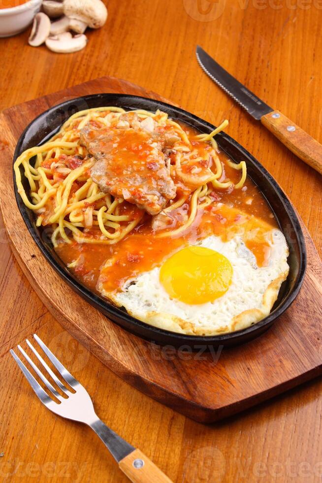 wagyu steak noodle and egg with barbeque sauce photo