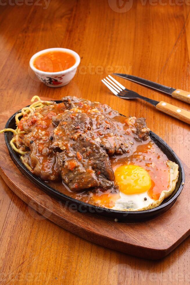 Rib double eye steak with barbeque sauce photo